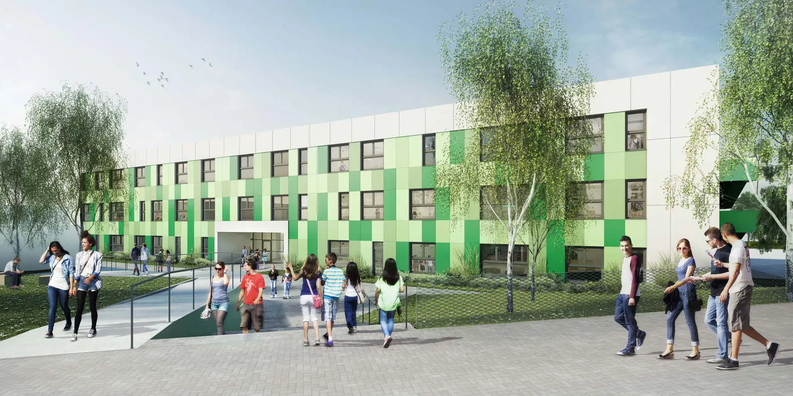langgezogenes Campusgebäude mit drei Stockwerken und bestrichen mit Qudadraten in drei verschiedenen Grüntönen